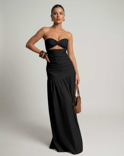 Noira Maxi Dress - Black strapless maxi dress with cutout high waist silhouette by Lauven, offering a sleek and elegant fit.