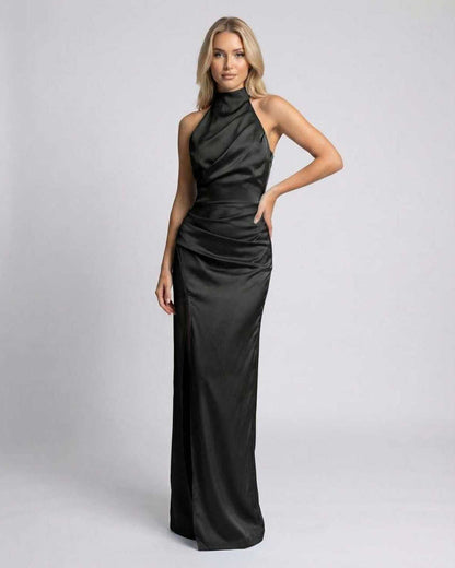 Noiré Maxi Dress featuring black satin, halter neck, high slit, flowy silhouette by Lauven, perfect for elegant occasions.