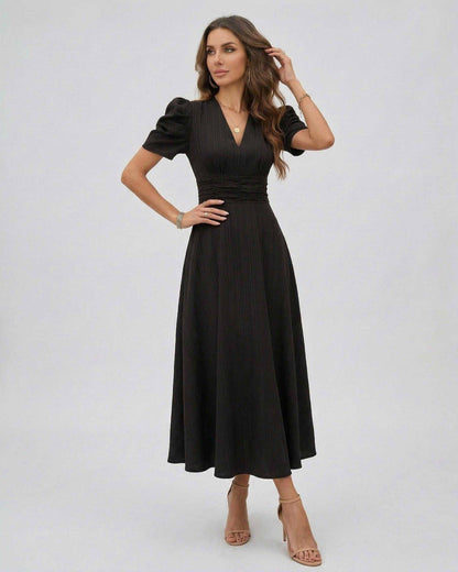 Elegant Noire Midi Dress by Lauven, featuring puff sleeves and a flattering V-neckline for sophisticated occasions.