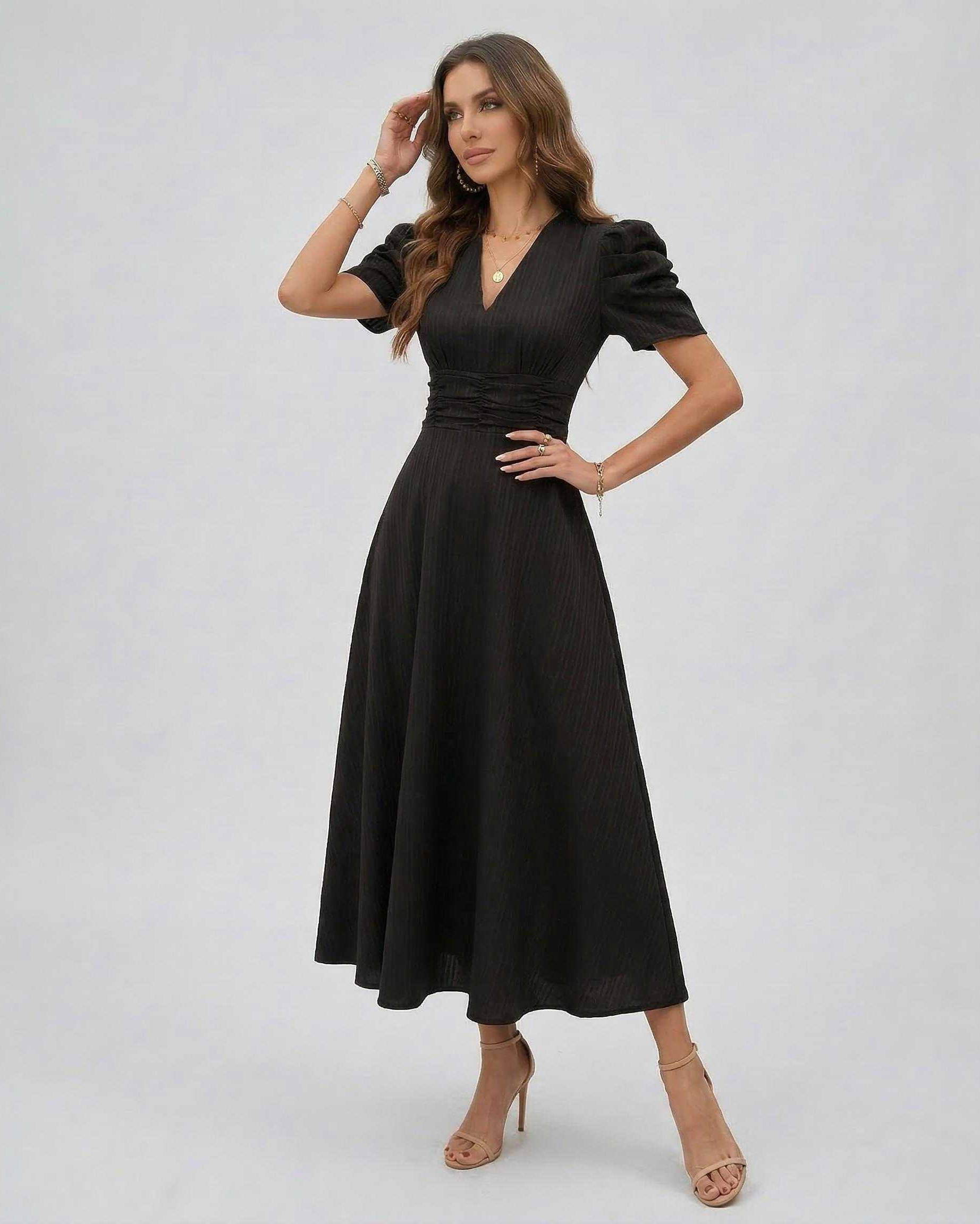 Noire Midi Dress in black with sleeves, featuring a deep V-neckline and structured puff sleeves for an elegant look by Lauven.