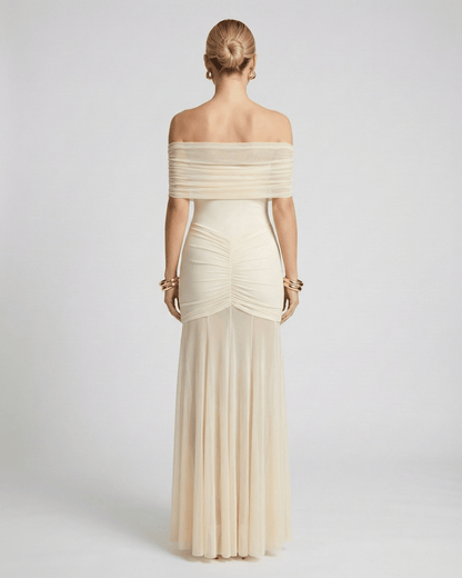 Elegant Noirline Maxi Dress with off-shoulder neckline and ruched bodice, perfect for stylish occasions by Lauven.