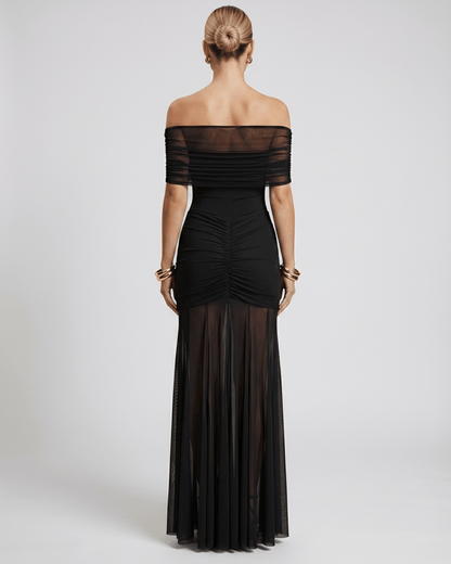Noirline Maxi Dress by Lauven, off-shoulder maxi dress with fitted bodice, ruched details, and flowing sheer skirt.