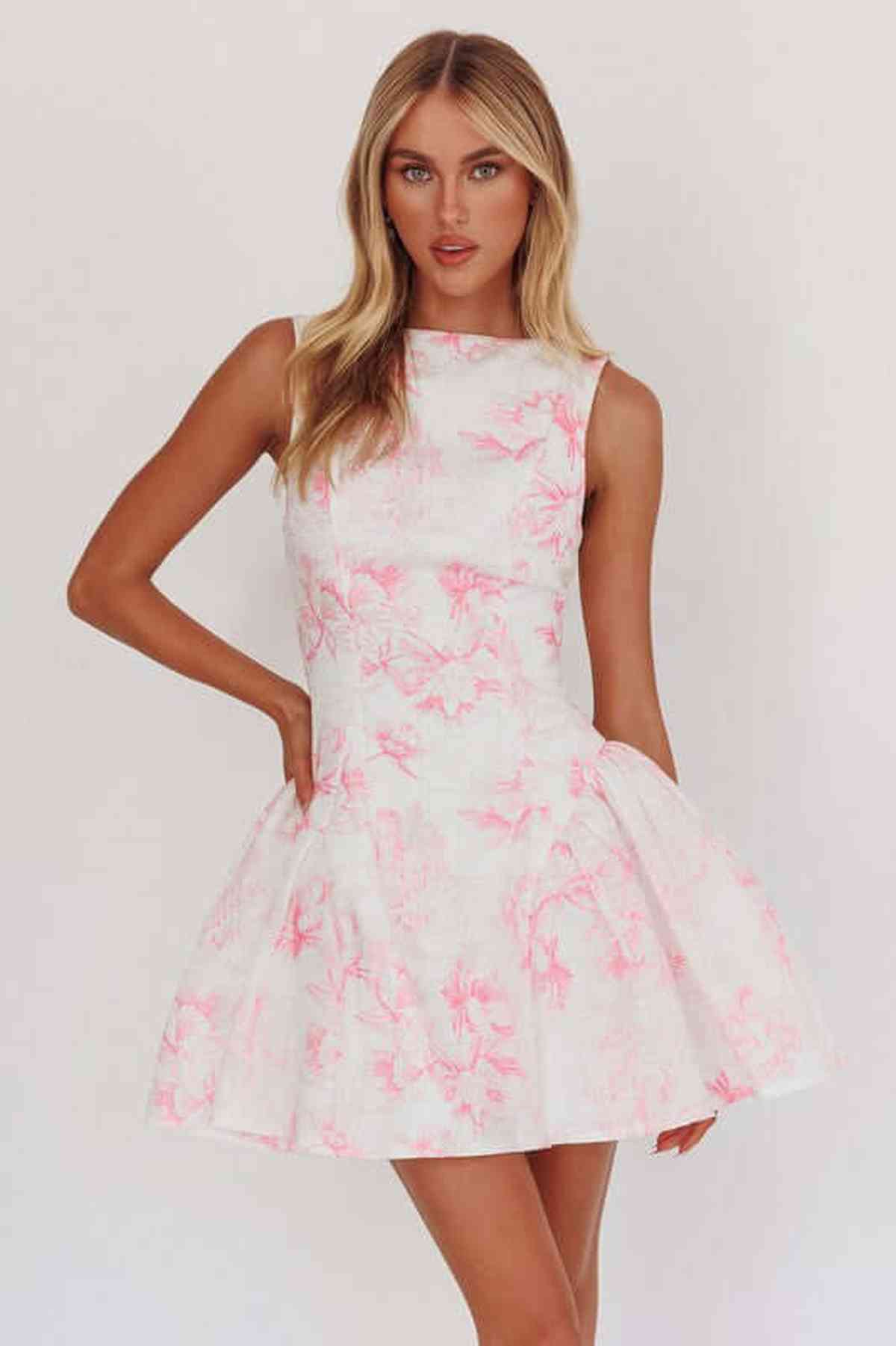 Nora Mini Dress with floral design, perfect for weddings, summer parties, and cocktail events.