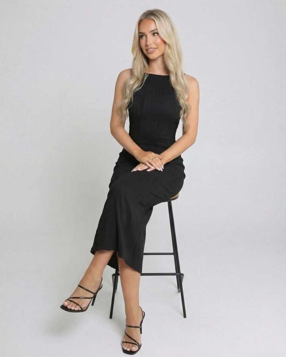 Nova Midi Dress by Lauven - Elegant black sleeveless dress with figure-flattering silhouette.