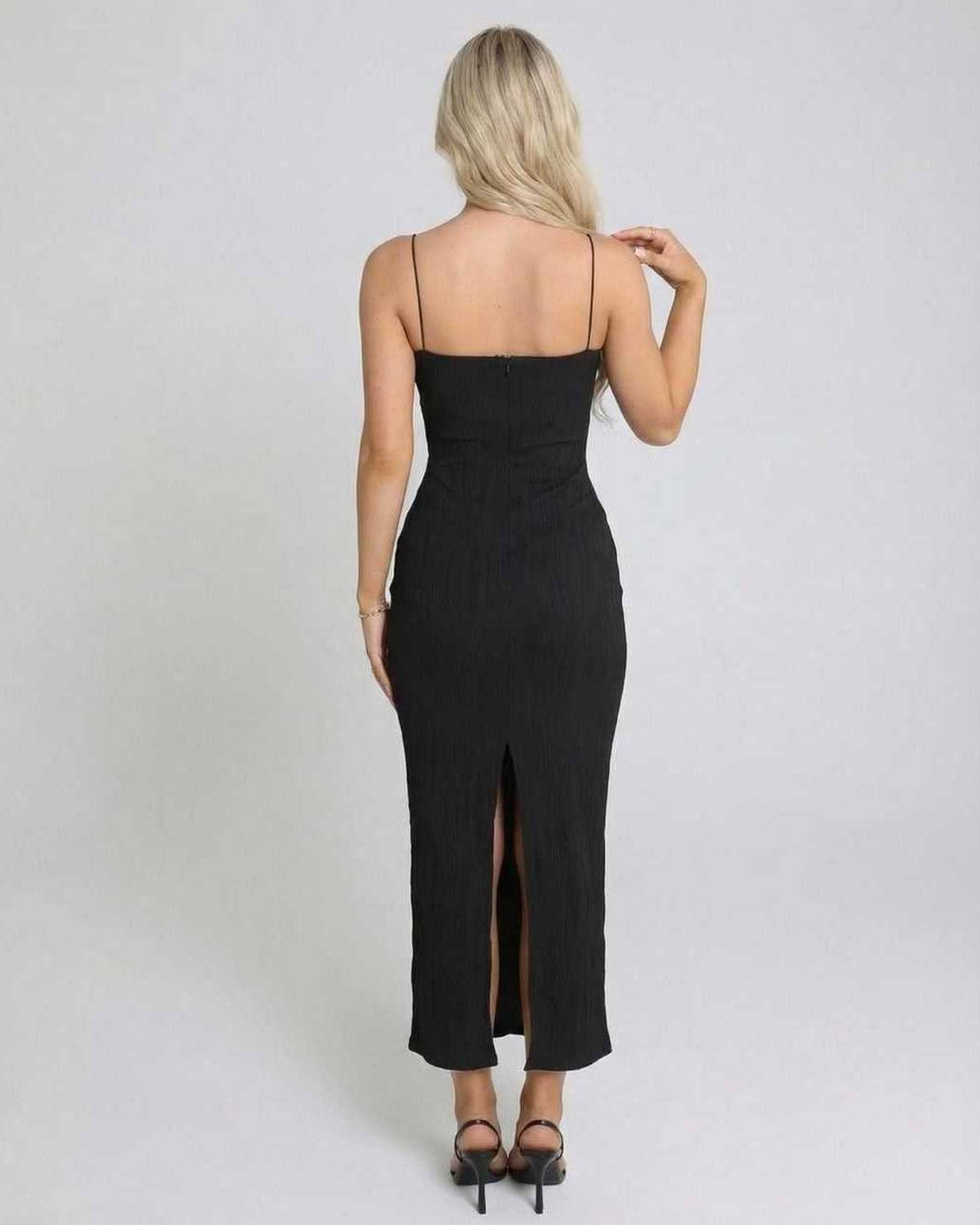 Nova Midi Dress by Lauven, elegant black sleeveless dress with a back slit and figure-flattering silhouette.