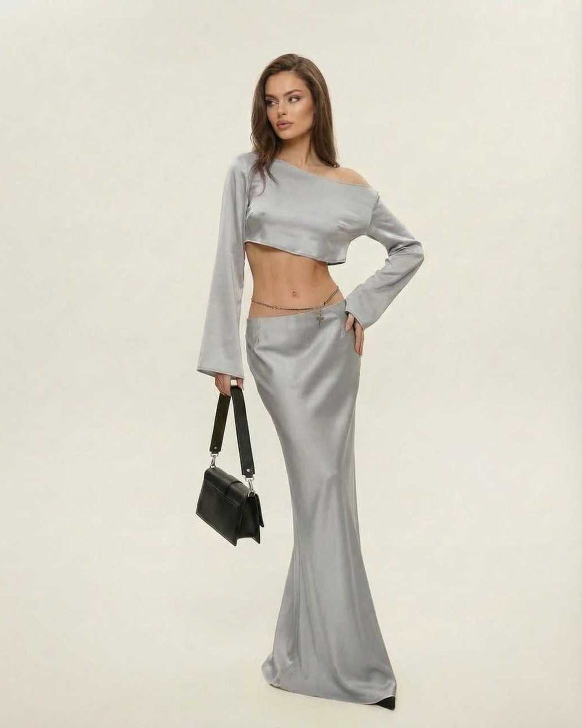 Nova Midi Dress by Lauven in sleek silver with an elegant asymmetrical silhouette and chic neckline.