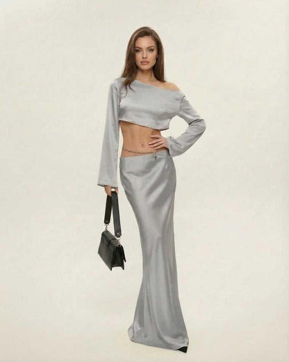 Nova Midi Dress by Lauven, featuring an elegant asymmetrical silhouette in sleek silver.