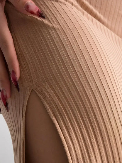 Close-up of the Nude Lace Midi Dress by Lauven showcasing ribbed fabric and thigh-high slit for elegant allure.
