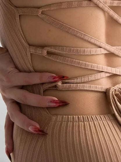 Nude Lace Midi Dress by Lauven, showcasing the corset back detail and ribbed knit fabric for body-hugging fit.