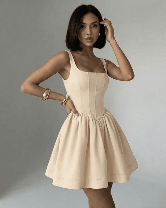 Nudea Mini Dress by Lauven featuring a structured corset design and square neckline in a refined nude tone.