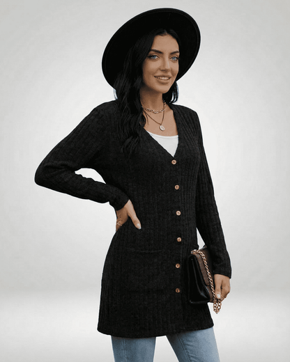 Nyx Cardigan by Lauven, longline button-front knitwear in black, styled with a hat and handbag.