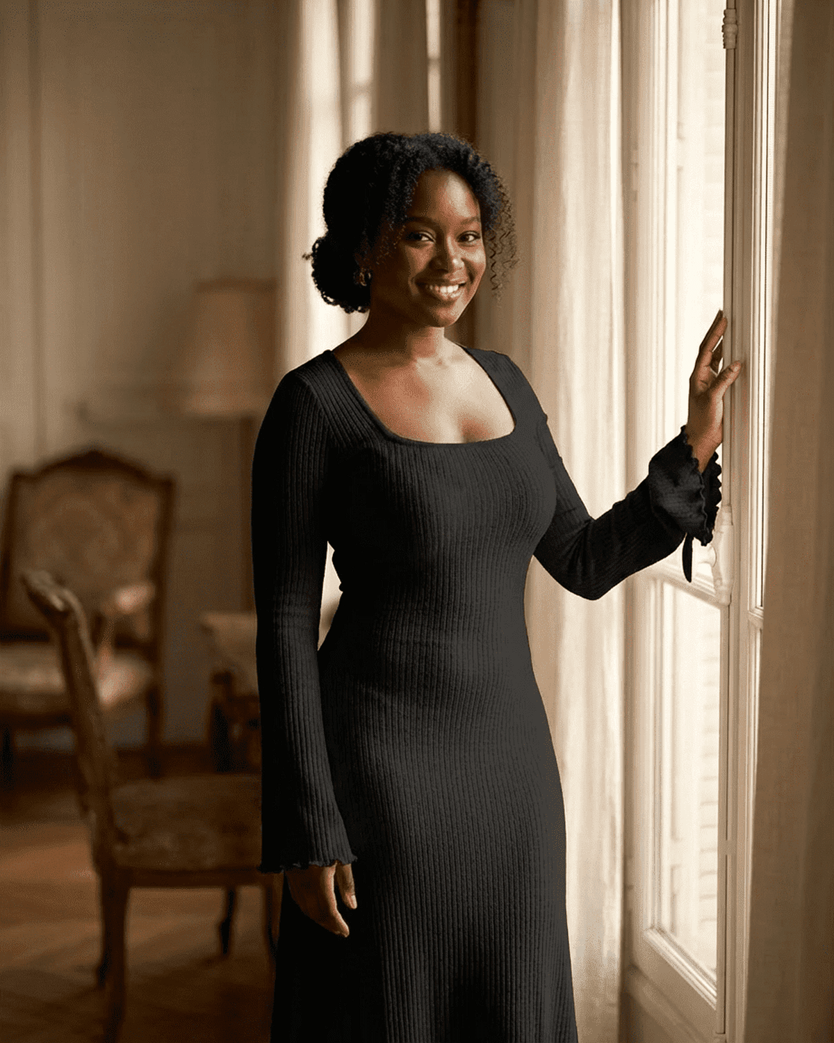 Woman wearing Lauven Nyx Maxi Dress with square neckline and long sleeves, showcasing a ribbed knit texture.