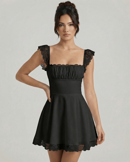 Nyx Mini Dress by Lauven in black, showcasing a lace A-line silhouette and structured bodice with sheer lace cap sleeves.