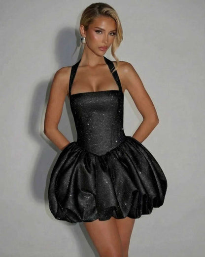 Obsidia Mini Dress by Lauven - a black sequin pouf mini dress with sleeveless design, high-waist silhouette, and elegant sparkle.