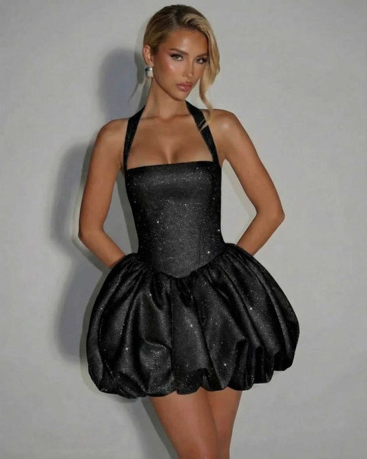 Obsidia Mini Dress by Lauven - a black sequin pouf mini dress with sleeveless design, high-waist silhouette, and elegant sparkle.