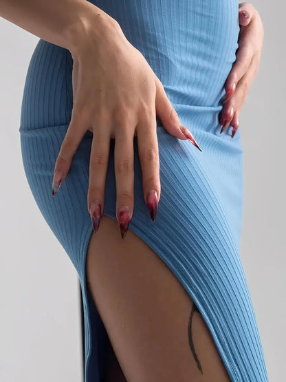 Ocean Lace Midi Dress detail showcasing ribbed texture, bold side slit, and model's hand with stylish nails.