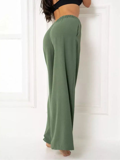 Olive Suit Set from Lauven, showcasing elegant oversized wide-leg trousers in soft green fabric.
