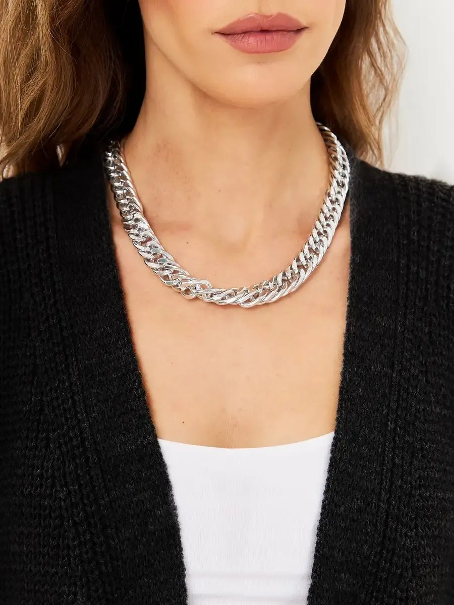 Onyx Cardigan worn with a stylish chunky silver chain necklace, showcasing cozy oversized knitwear from Lauven.