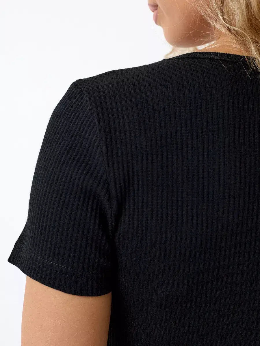 Onyx Midi Dress back view showcasing sleek ribbed knit details by Lauven