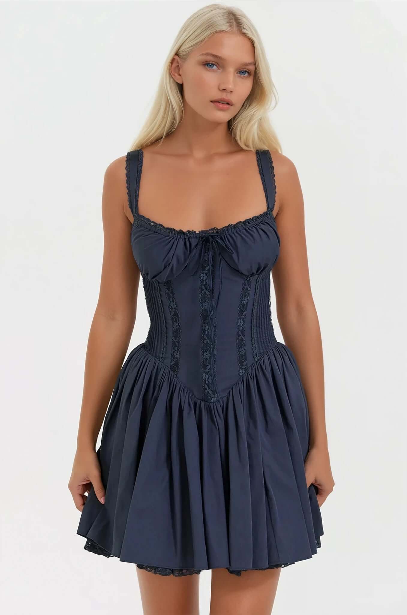 Navy blue mini dress featuring a fitted bodice and flared skirt, perfect for summer parties and evening events.