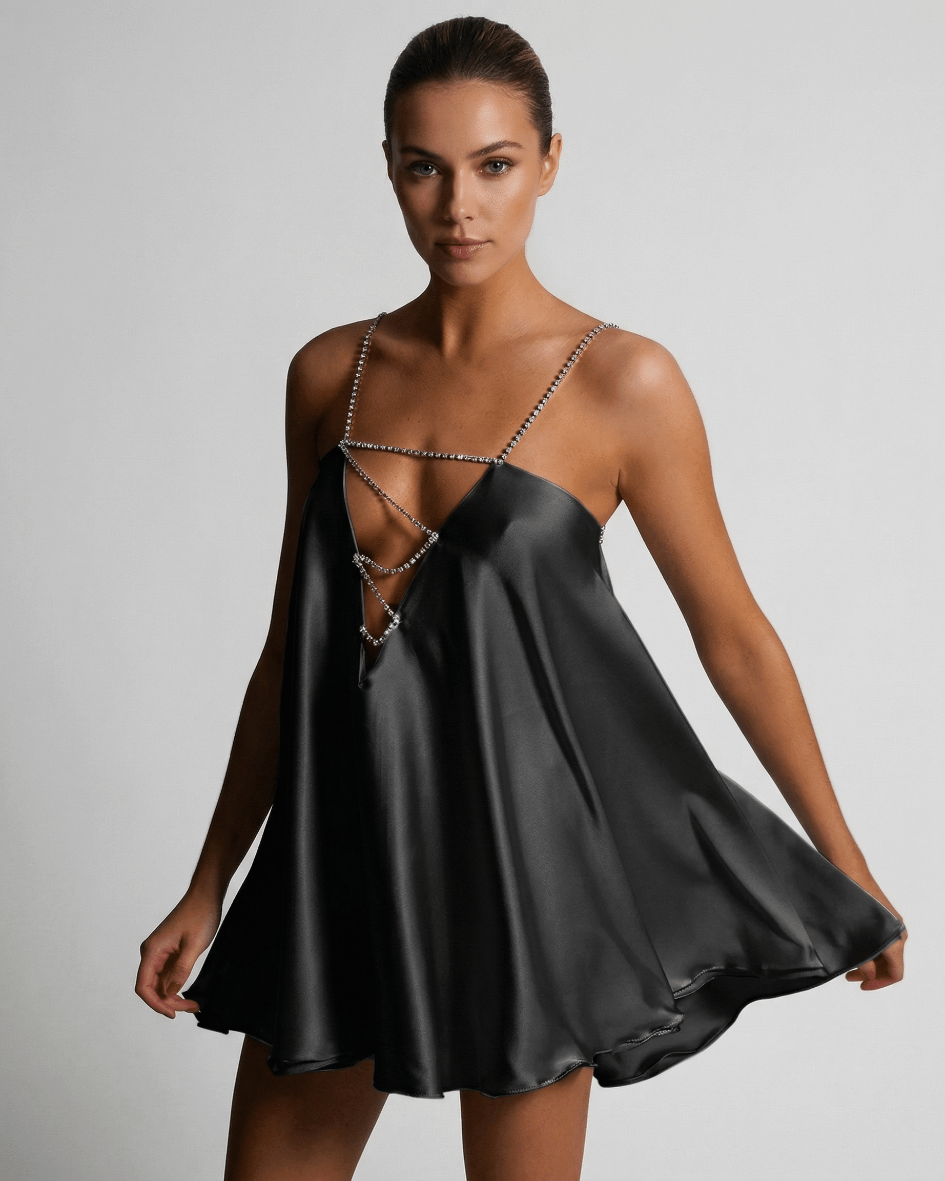 Midnight Mini Dress by Lauven, sexy A-Line silhouette with V-neck and delicate spaghetti straps.