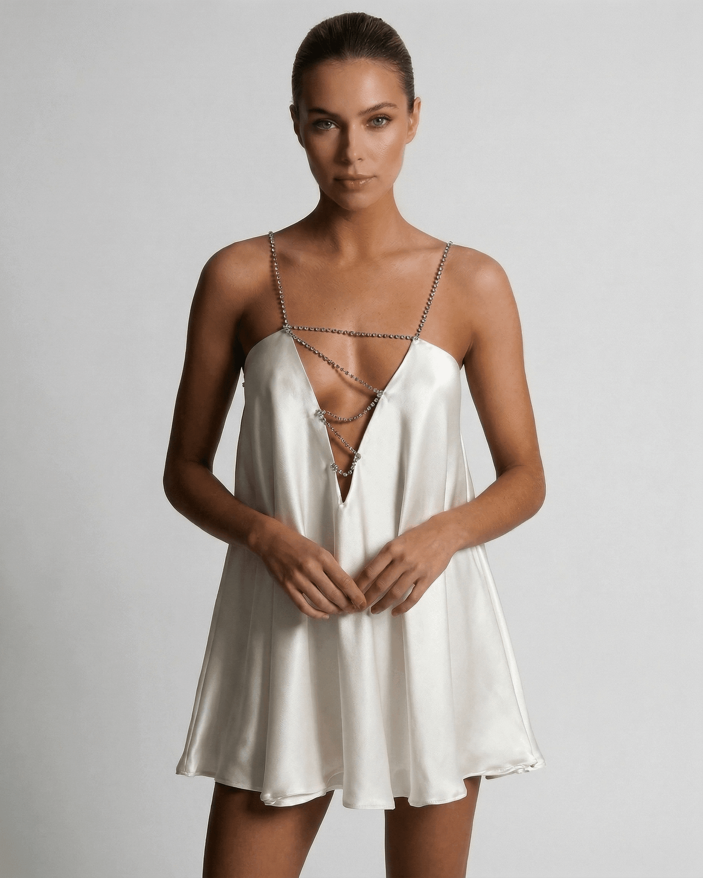 Alba Mini Dress from Lauven, elegant satin A-line dress with rhinestone accents in classic ivory shade.