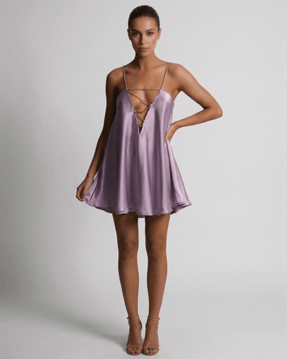 Lyra Mini Dress by Lauven in soft lilac satin with rhinestone detail, featuring a flattering A-line silhouette.