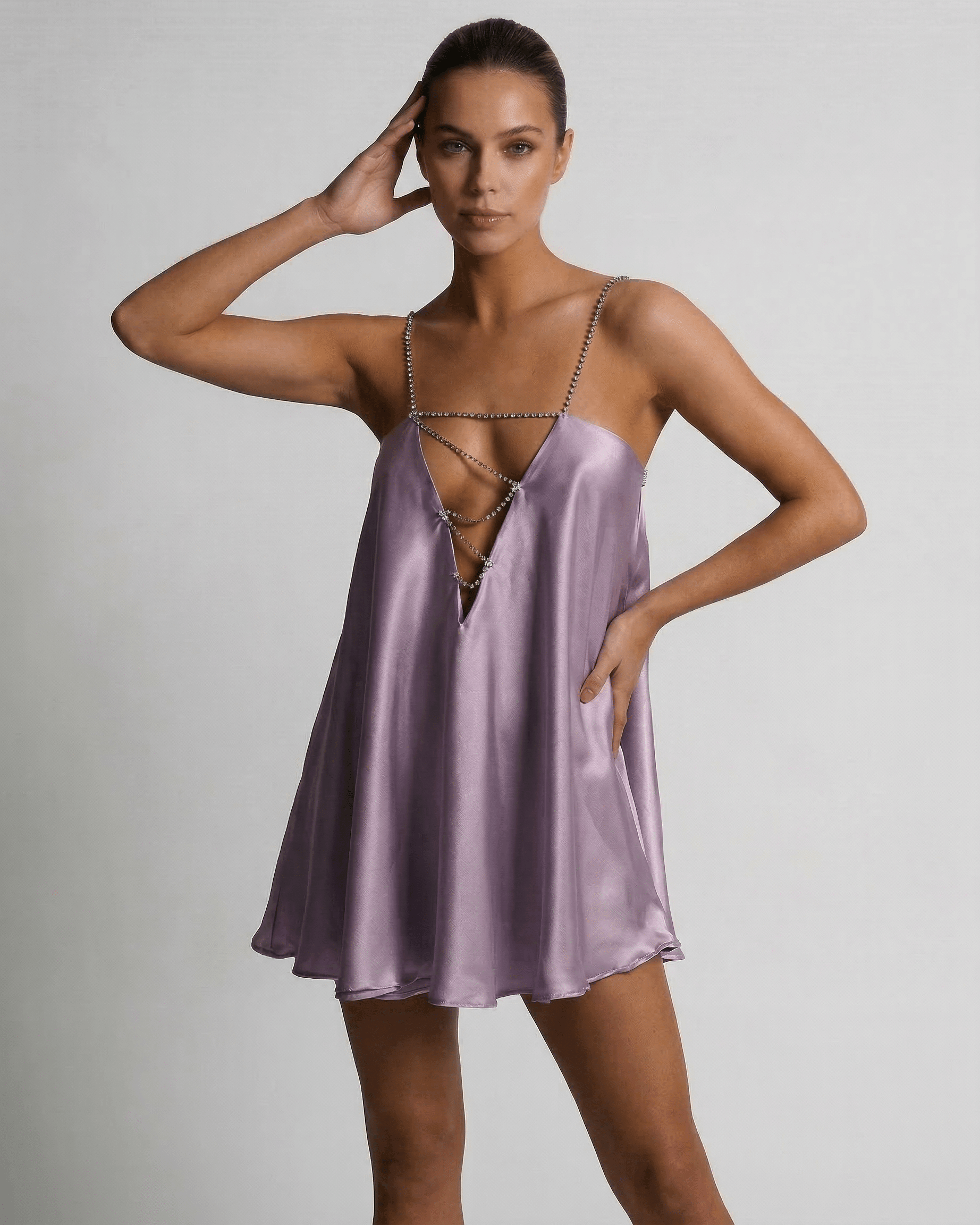 Lyra Mini Dress by Lauven in soft lilac satin with rhinestone detail, showcasing a flattering A-line silhouette.