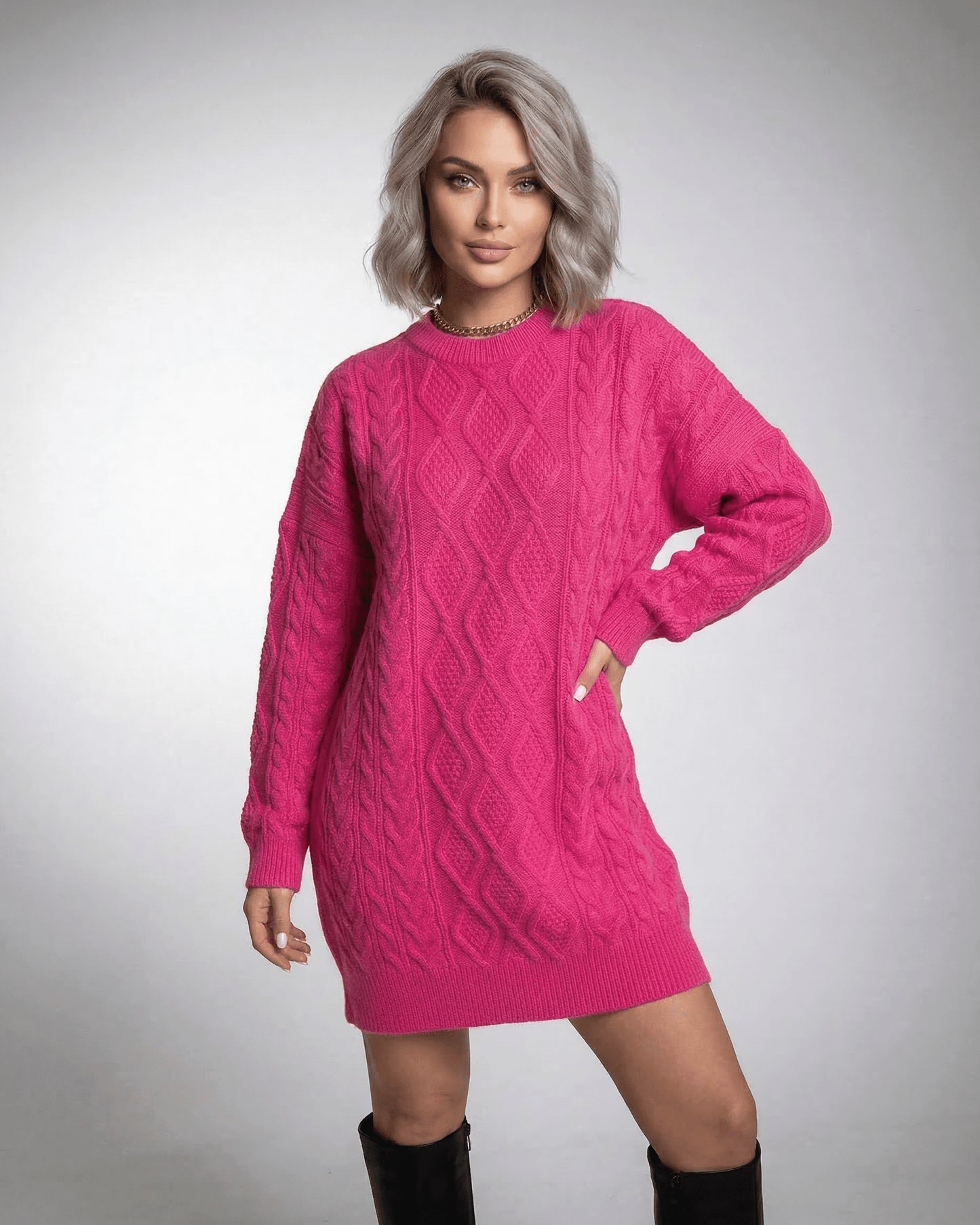 Luna Mini Dress in Vibrant Pink Cable Knit by Lauven showcasing relaxed silhouette and crew neckline.