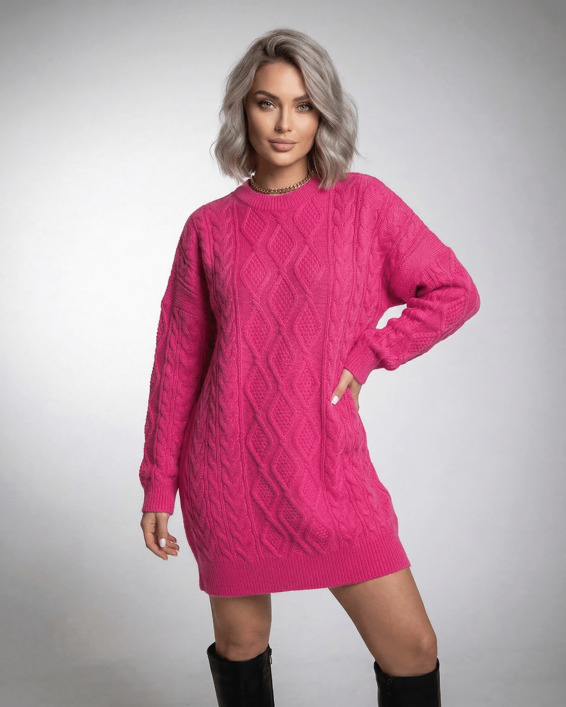 Luna Mini Dress in Vibrant Pink Cable Knit by Lauven showcasing relaxed silhouette and crew neckline.