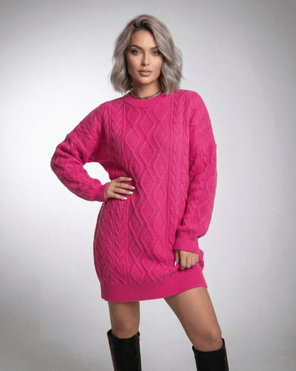 Lauven Luna Mini Dress in vibrant pink cable knit with dropped long sleeves and relaxed silhouette.