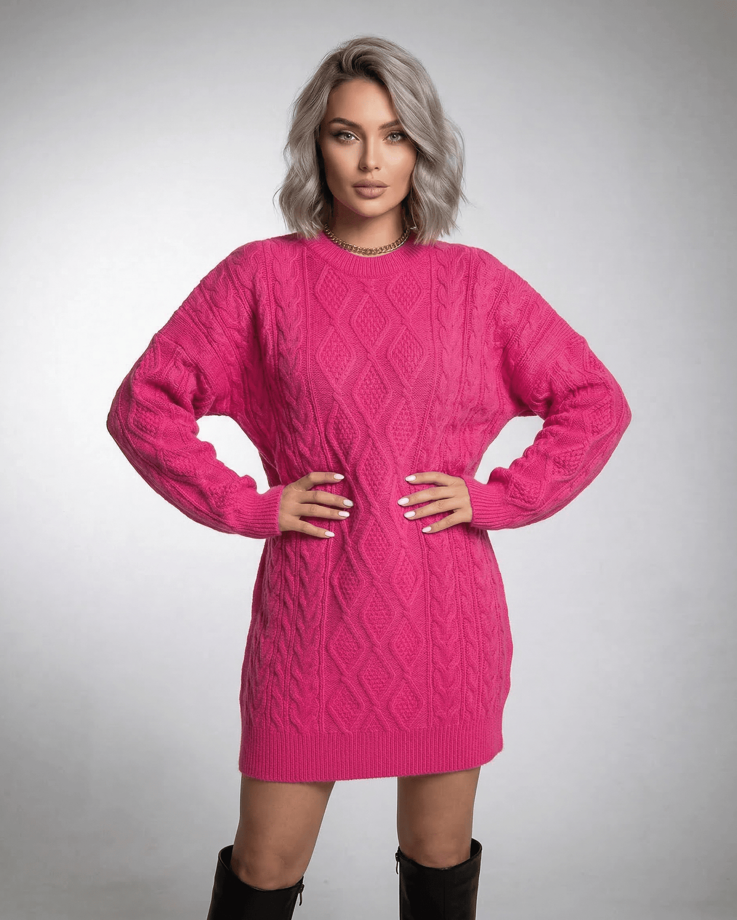 Lauven Luna Mini Dress in vibrant pink cable knit with relaxed silhouette and dropped long sleeves.