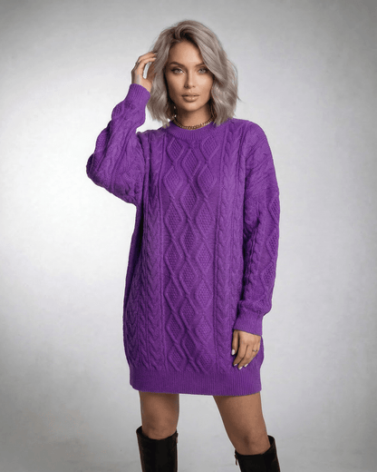 Violet Mini Dress by Lauven, showcasing a vibrant purple cable knit with a relaxed fit and dropped long sleeves.
