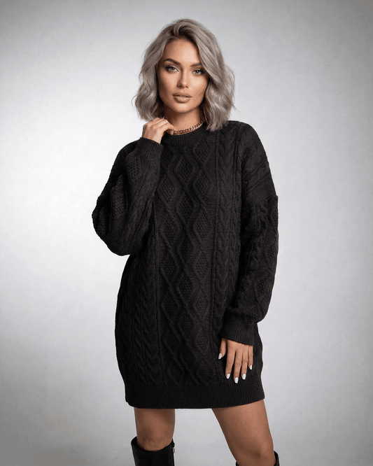 Onyx Mini Dress by Lauven in deep black cable knit fabric, showcasing a relaxed fit and cozy texture.