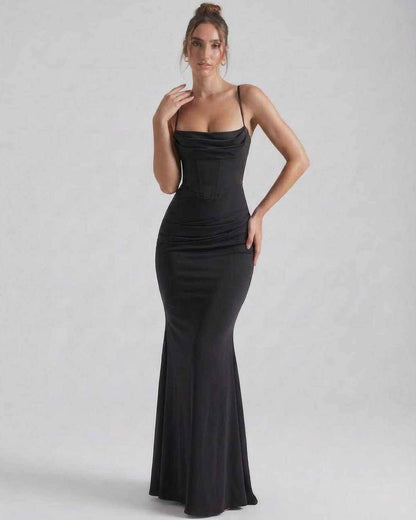 Orion Maxi Dress by Lauven, elegant sheath silhouette with sleek spaghetti straps, crafted from luxurious black fabric.