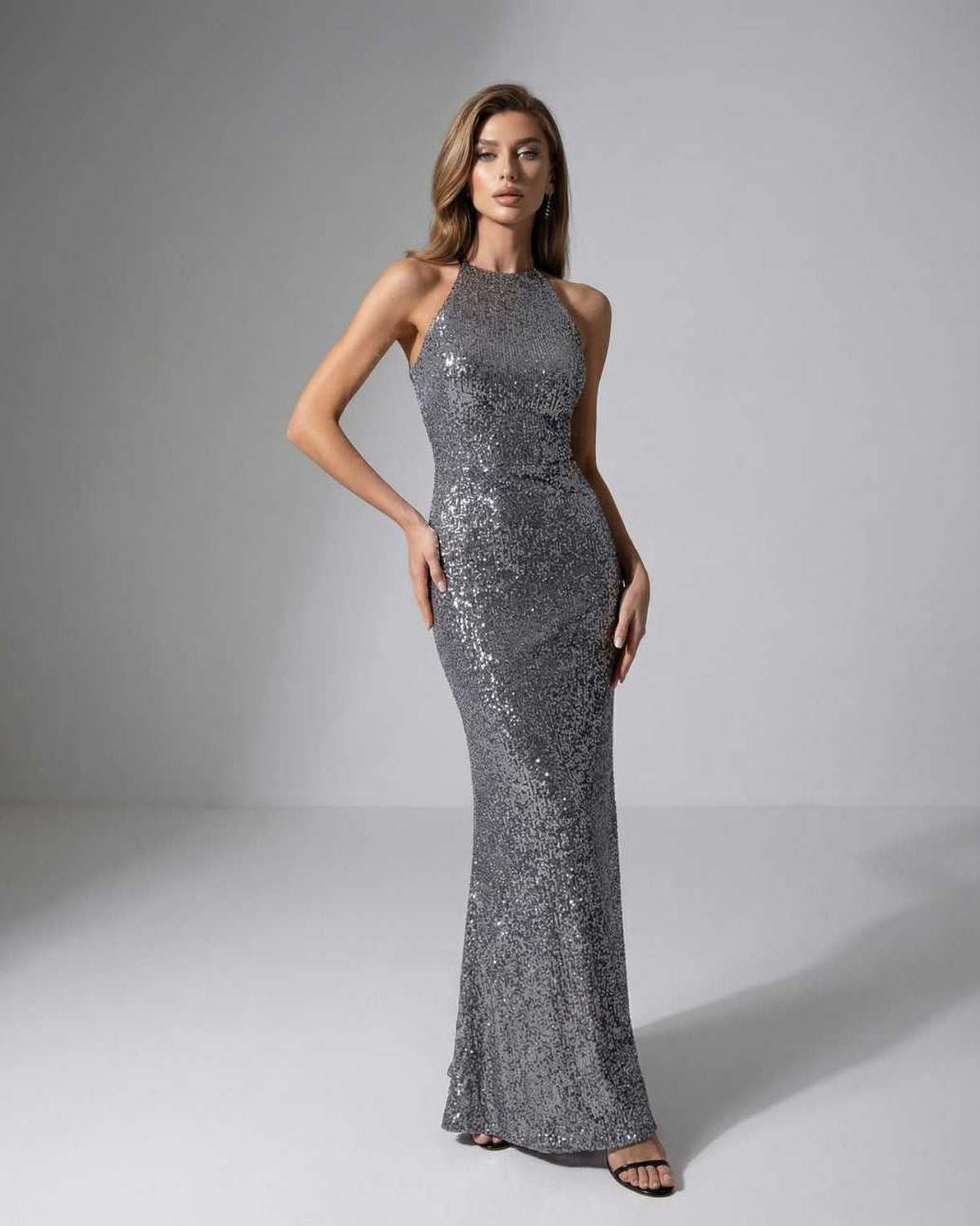 Orion Maxi Dress - Silver sequin halter neck with a sleek silhouette by Lauven, perfect for evening elegance.