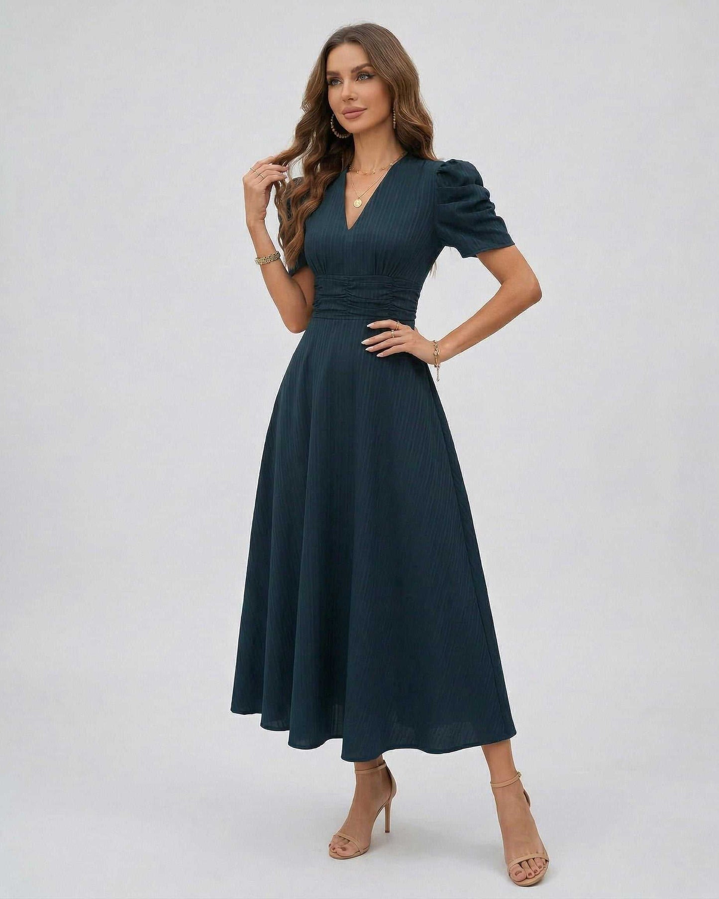 Orion Midi Dress featuring dark teal color, puff sleeves, and flattering V-neckline by Lauven, perfect for weddings and cocktails.