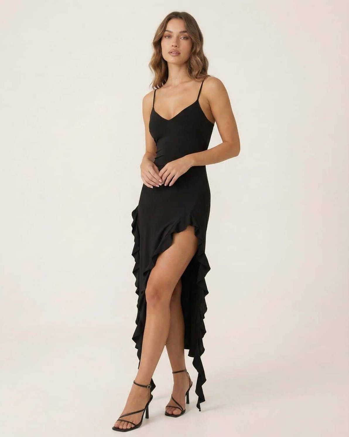 Orion Midi Dress by Lauven featuring elegant ruffle details and a flattering slim fit silhouette in black.