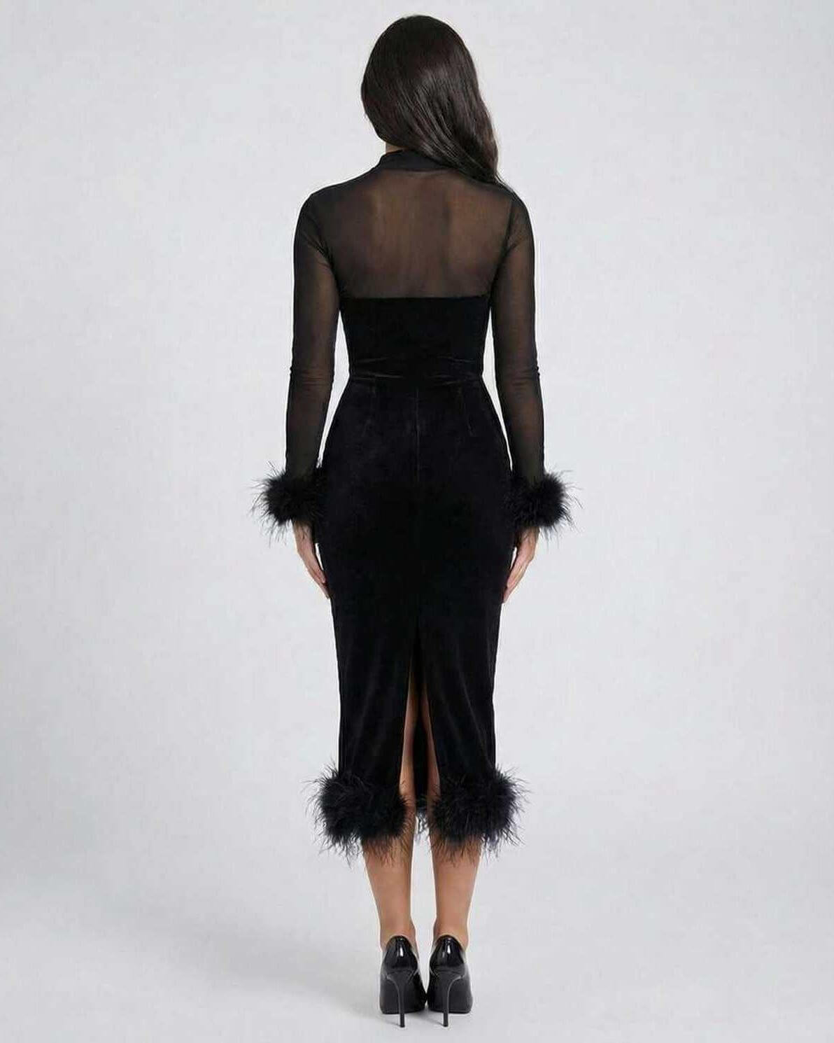Orion Midi Dress by Lauven featuring feather trim and sheer mesh detail, showcasing back view on model.