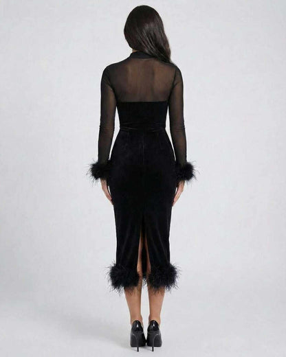 Orion Midi Dress by Lauven featuring feather trim and sheer mesh detail, showcasing back view on model.