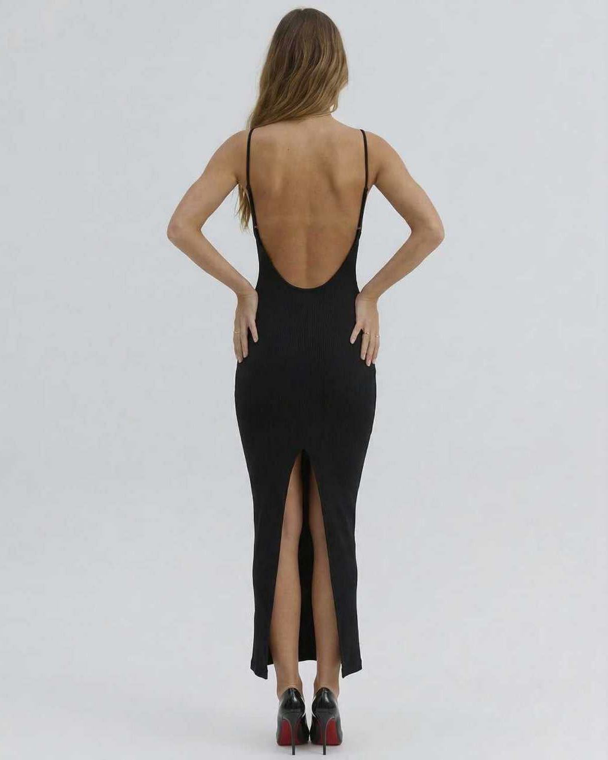 Back view of Lauven's Orion Midi Dress, a sexy, cut-out V-neck dress showcasing a slim-fit silhouette.