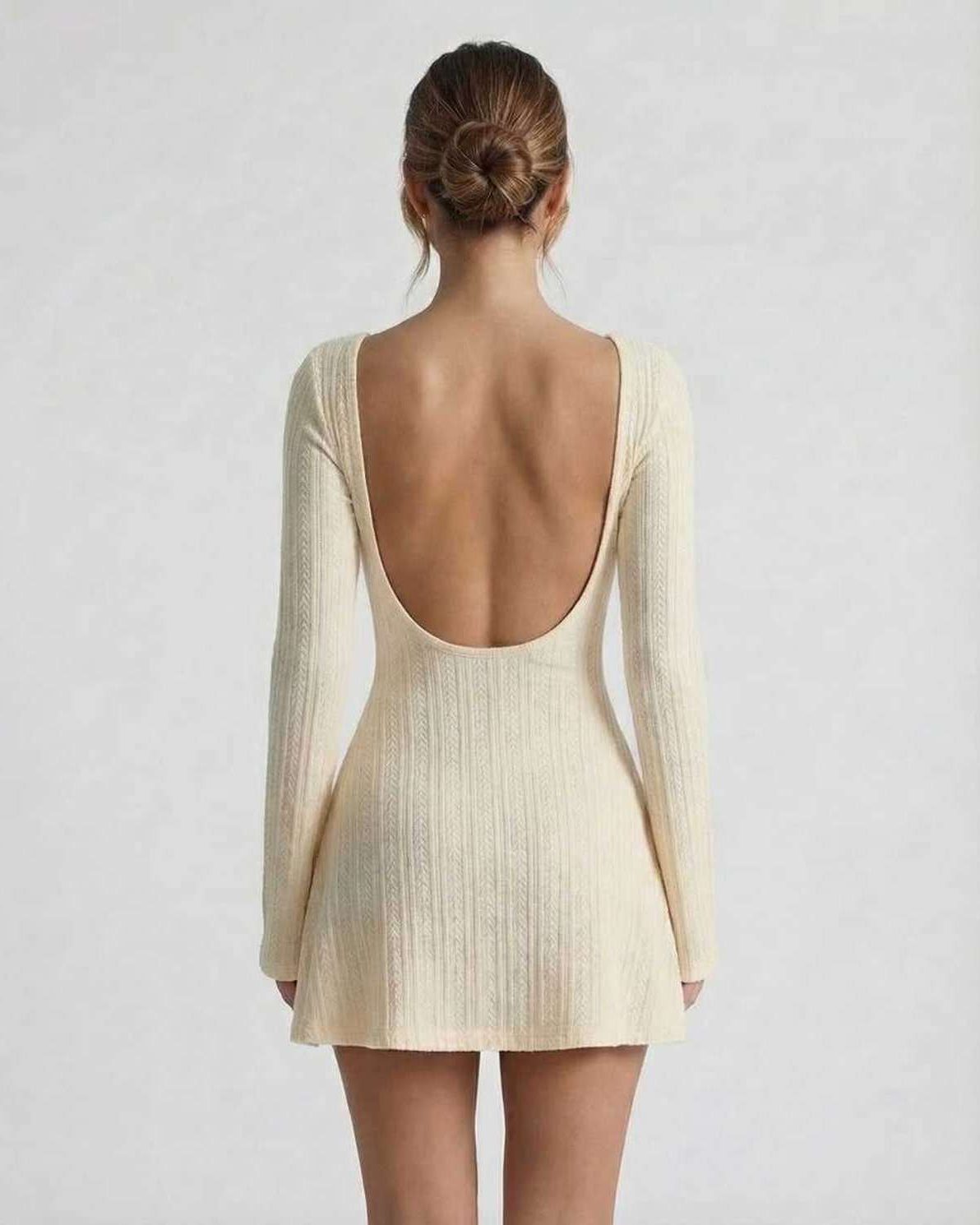 Orion Mini Dress by Lauven, elegant cable knit, long sleeve, soft cream color, sophisticated silhouette, cozy feel.