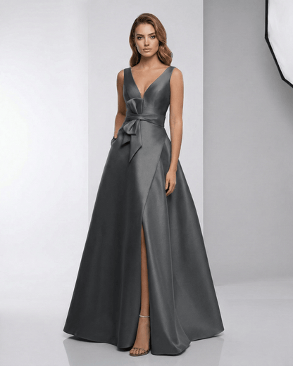 Orlena Maxi Dress featuring a charcoal satin A-line silhouette with a V-neckline and elegant flowing skirt by Lauven.