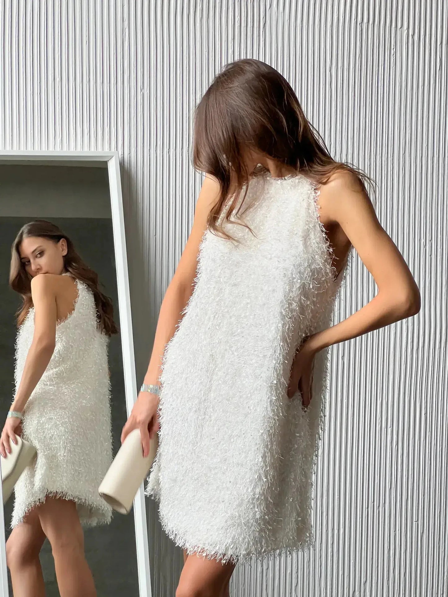 Elegant white Pearl Halo mini dress with textured fringe, perfect for summer parties and wedding guests.