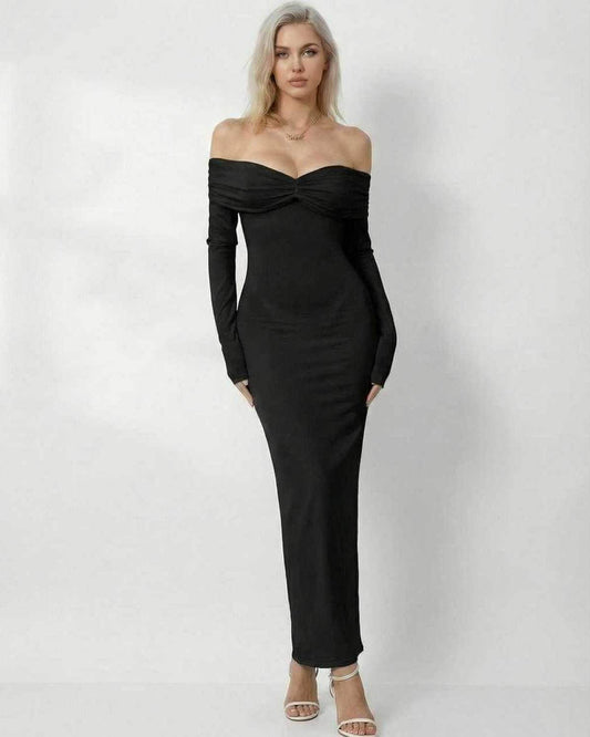 Elegant woman in Noir Maxi Dress by Lauven, showcasing an off-shoulder silhouette and sleek design.