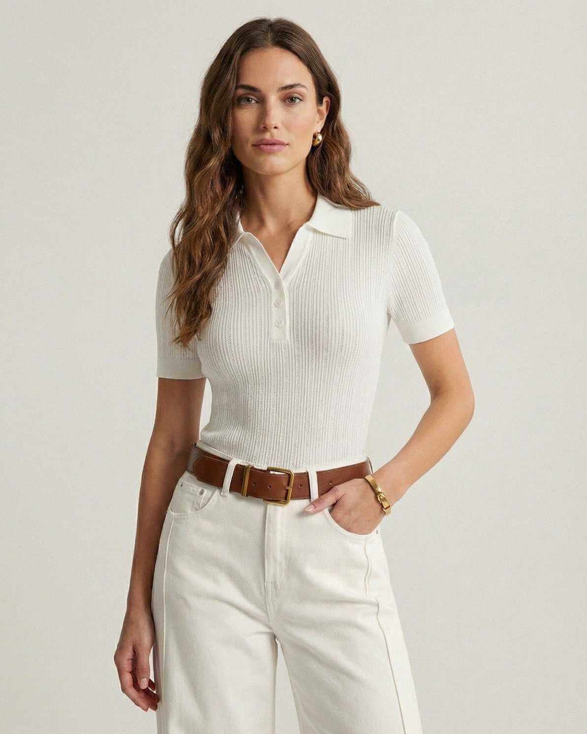 Monaco Polo Shirt by Lauven – Women’s white ribbed cotton polo shirt styled with high-waisted pants.