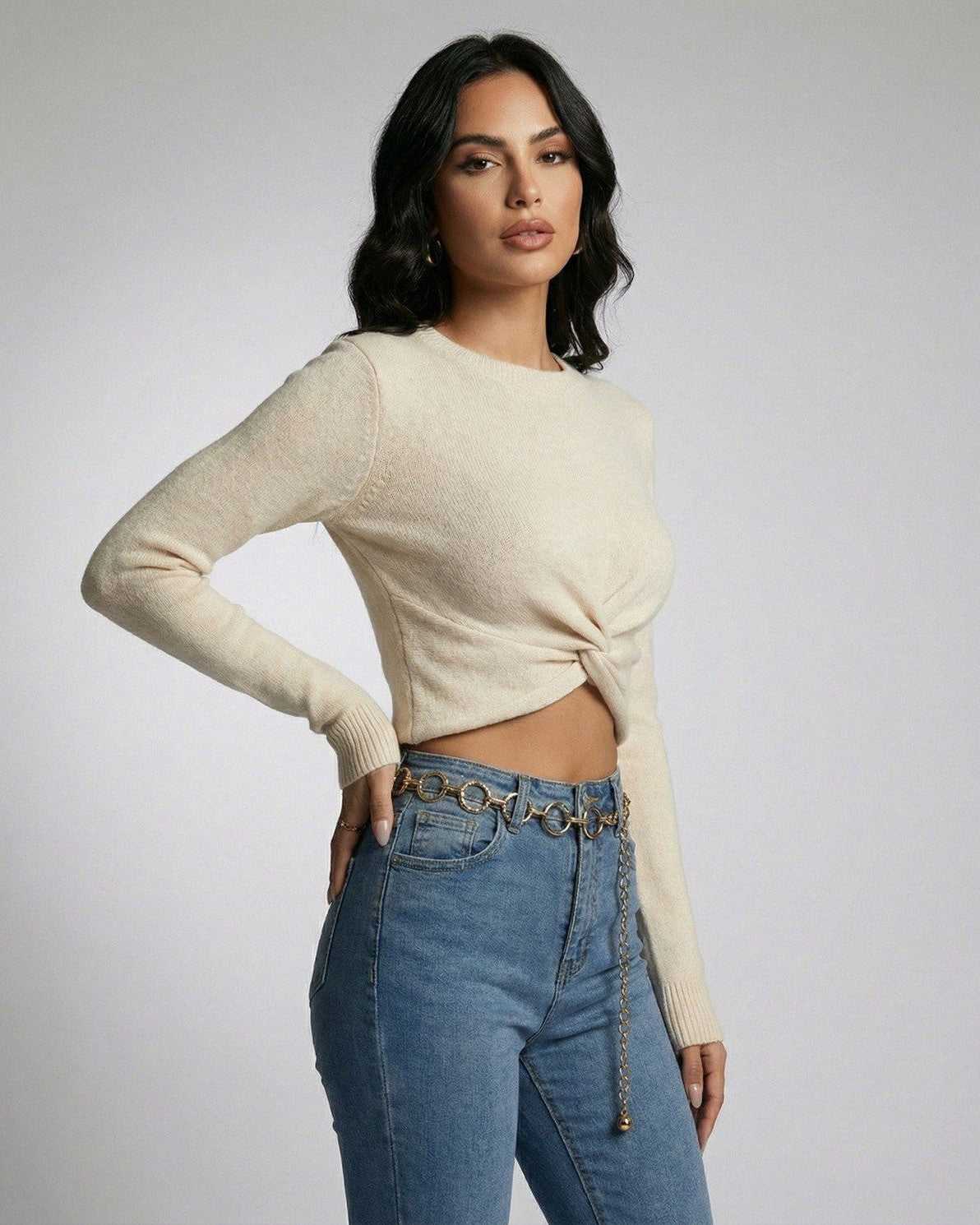 Sahara Pullover by Lauven – Women’s beige knit pullover with knotted front detail and modern silhouette.