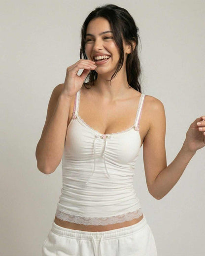 Lunelle Top by Lauven – Soft ivory lace camisole with bow detail, perfect for feminine elegance.