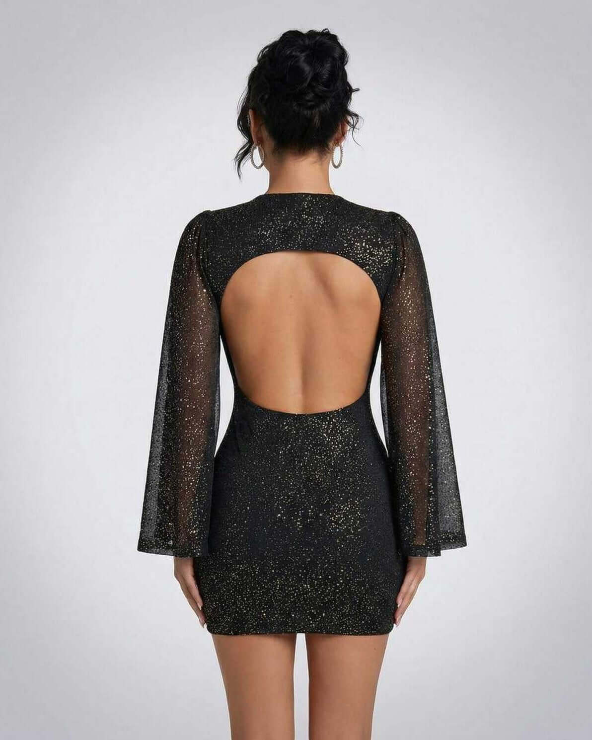 Celeste Mini Dress by Lauven featuring sheer cloak sleeves and sparkling dot pattern, back view.