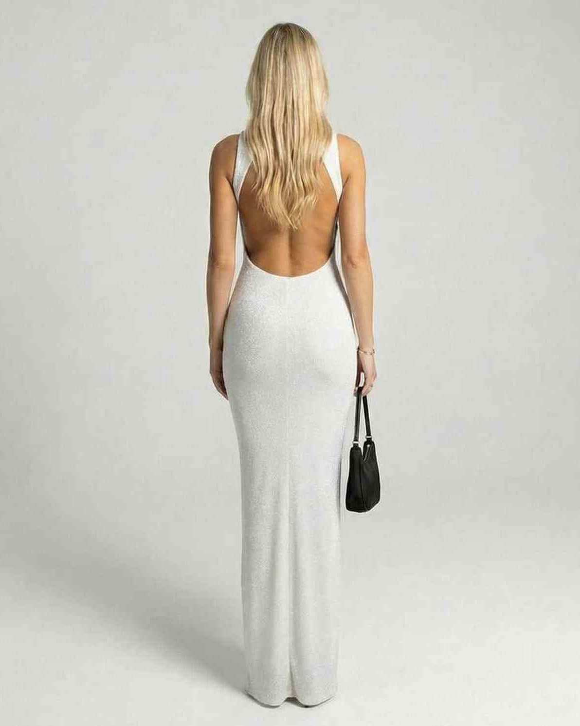 Lunara Maxi Dress by Lauven, showcasing a sleek white backless evening gown with a shimmering finish.